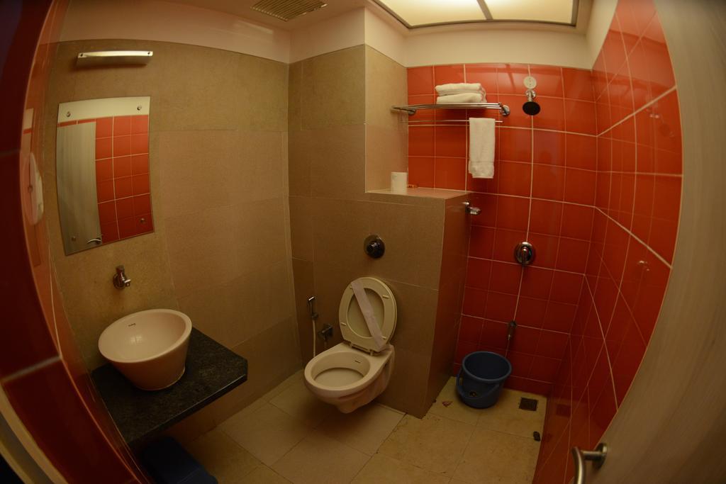 Hotel Ayush International Mangalor Szoba fotó