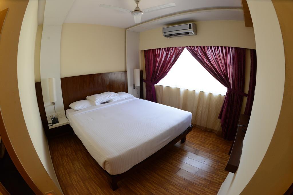Hotel Ayush International Mangalor Szoba fotó